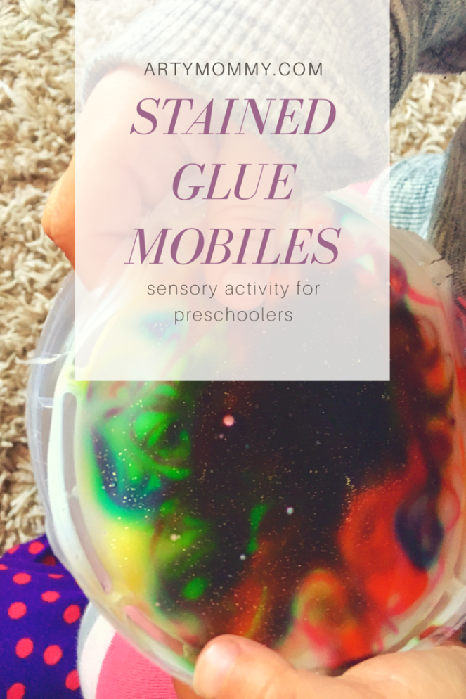 Glue mobiles out of plastic lids, glue and food coloring 