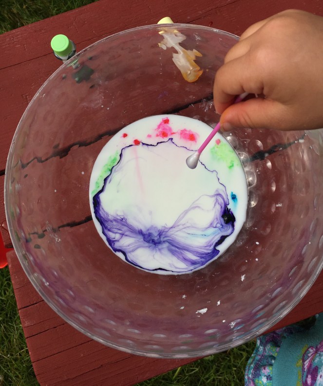 Magic milk from milk, dish soap and food coloring