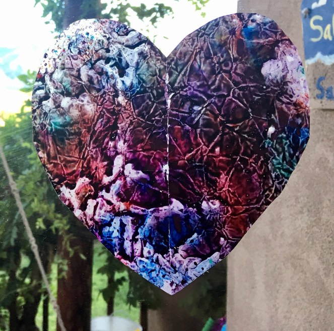 Wax paper crayon stained glass and liquid watercolor 